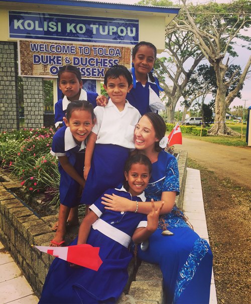 Katie Lowe teaches English as a Second Language in Tonga where she's been living for the past two years as a Peace Corps volunteer. Here, she's with a few of her students.